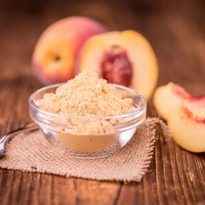 La polvere di frutta di pesca è un'alternativa naturale alle pesche fresche.