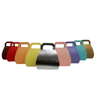Pralinenverpackung Handtasche Gold für edel verpackte Pralinen
