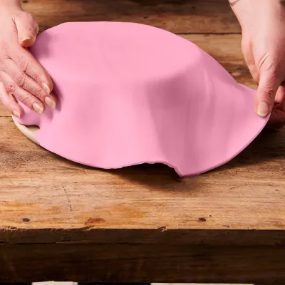 Couverture de fondant roulé rose