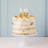 Number candle 8 with white and gold
