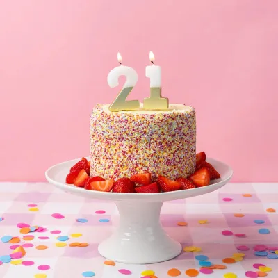 Number candle 21 with white and gold