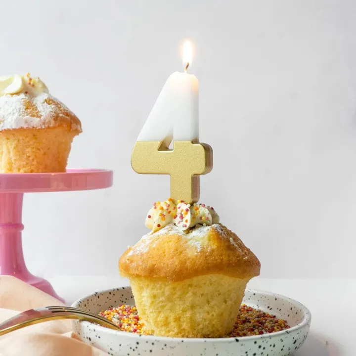Number candle 4 with white and gold