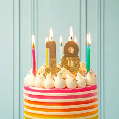 Number candle 8 with gold and gold glitter