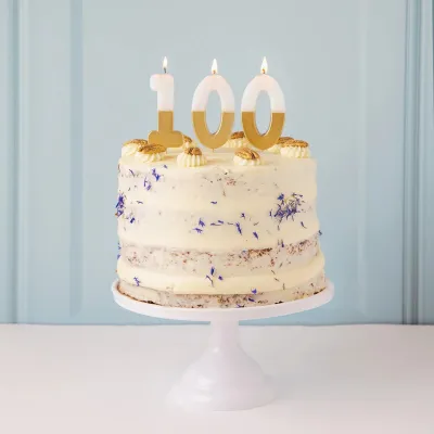 Number candle 0 with white and gold