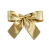 Bow with clip, gold