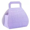 Purple handbag chocolate packaging for elegantly wrapped chocolates