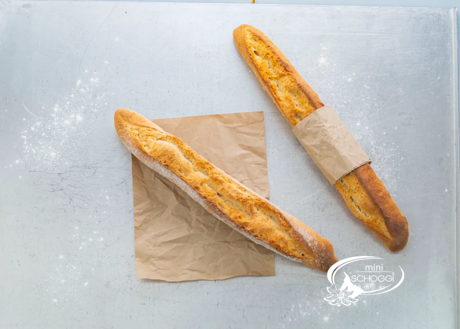 Golden-brown baked loaves in the oven with a crisp crust