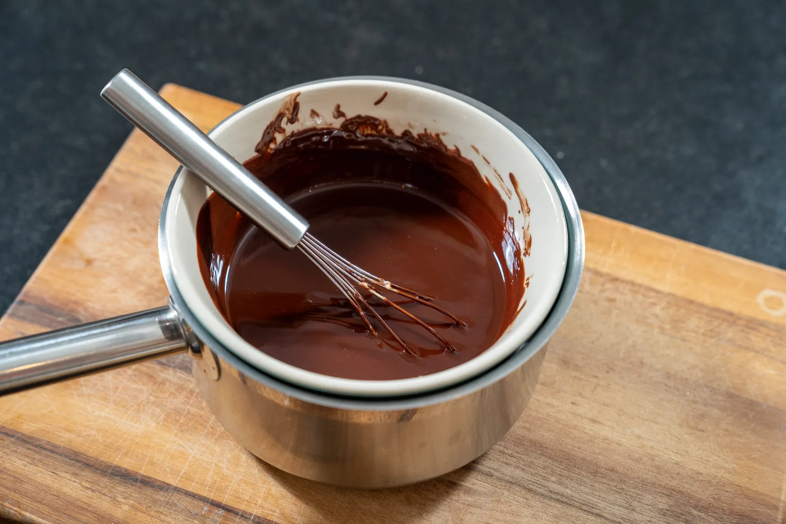Melted dark chocolate with butter, stirred smooth