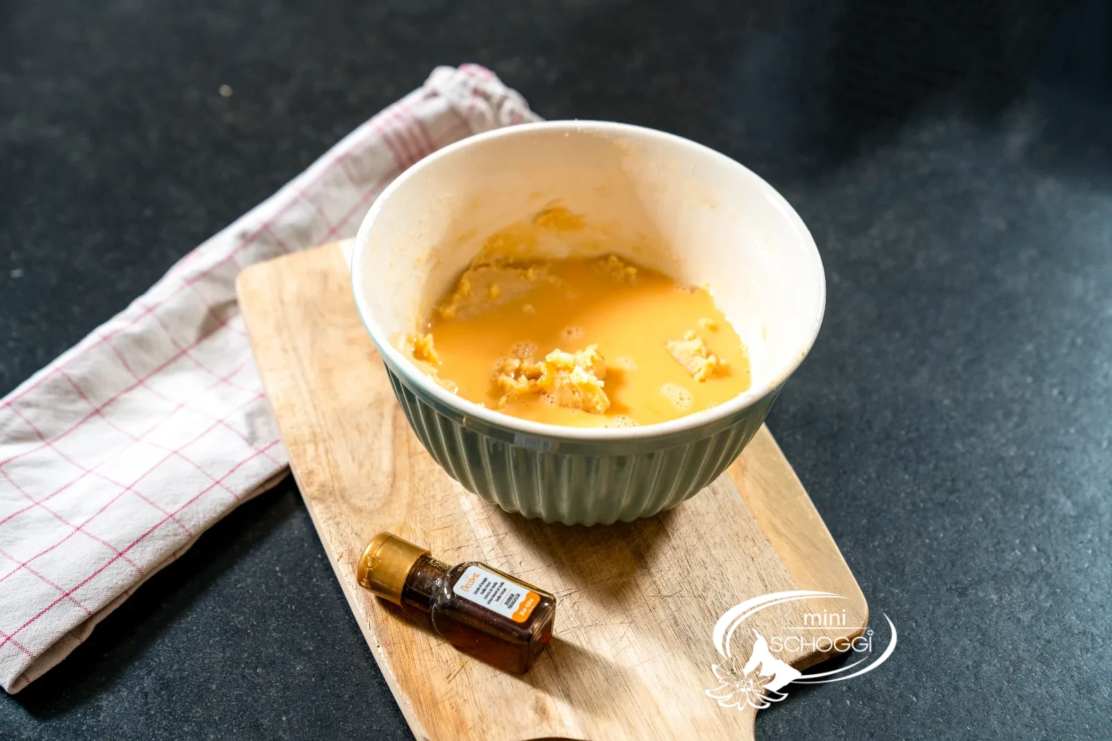 Cream butter and sugar and work in eggs and vanilla