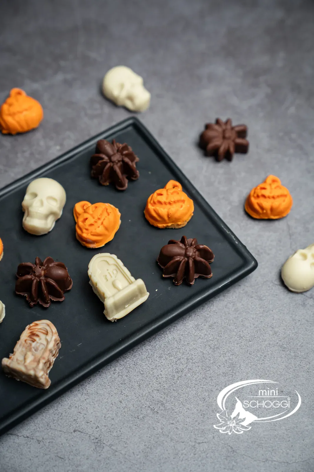 Weisse, orange, dunkle und marmorierte Schoggiguetzli