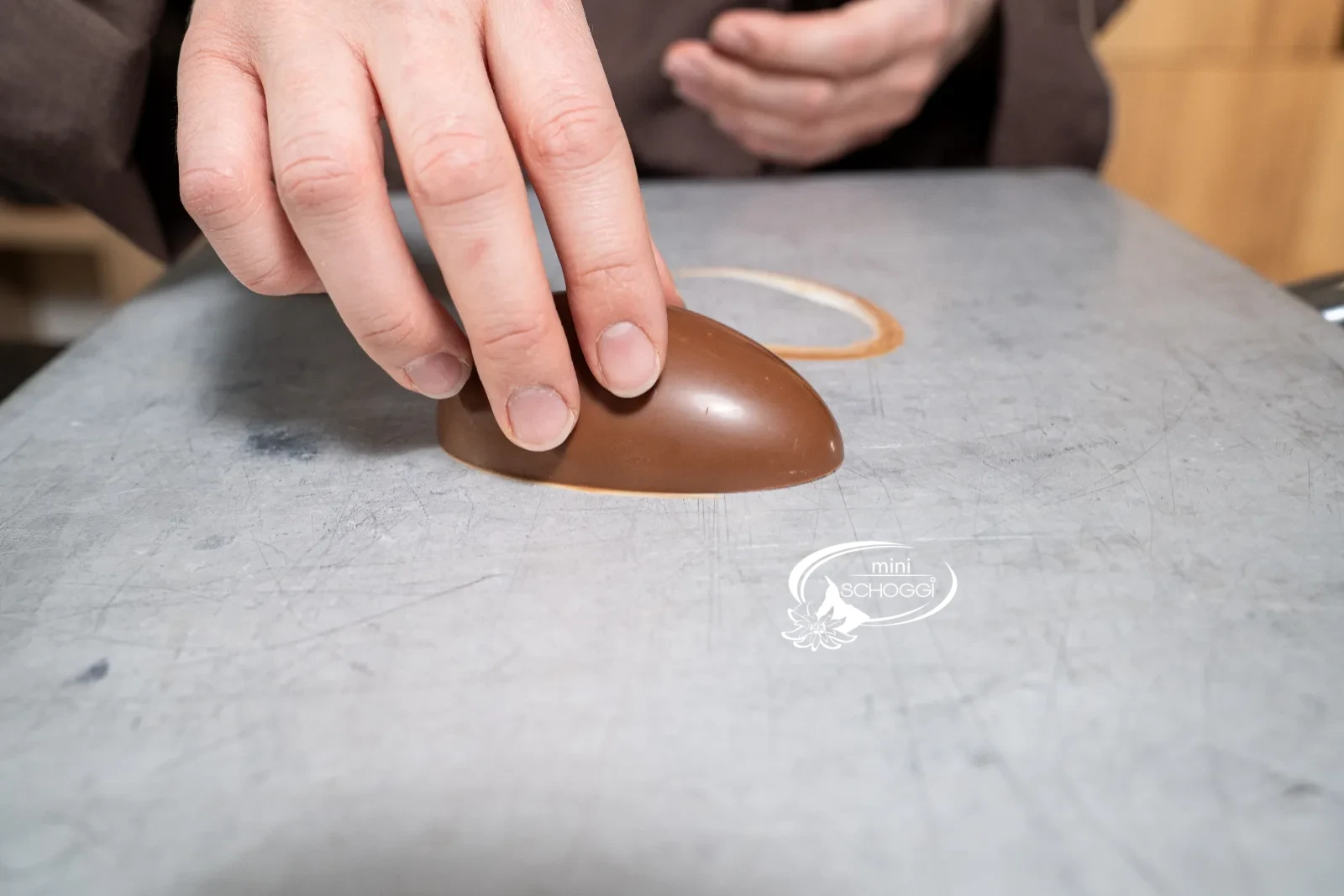 The edge of the egg half is melted on the warm tray
