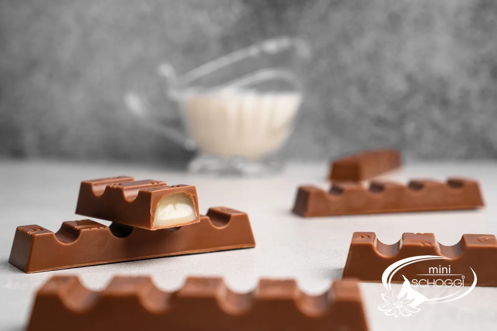 Homemade chocolate bars with light condensed milk ganache, sliced open