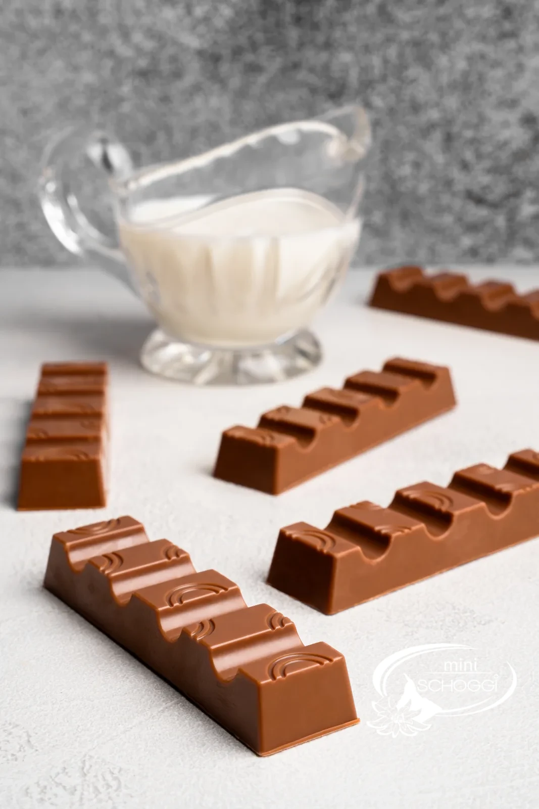 Homemade chocolate bars with light condensed milk ganache, sliced open