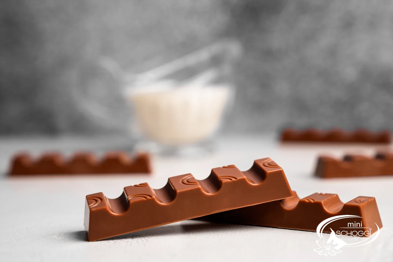 Homemade chocolate bars with light condensed milk ganache, sliced open