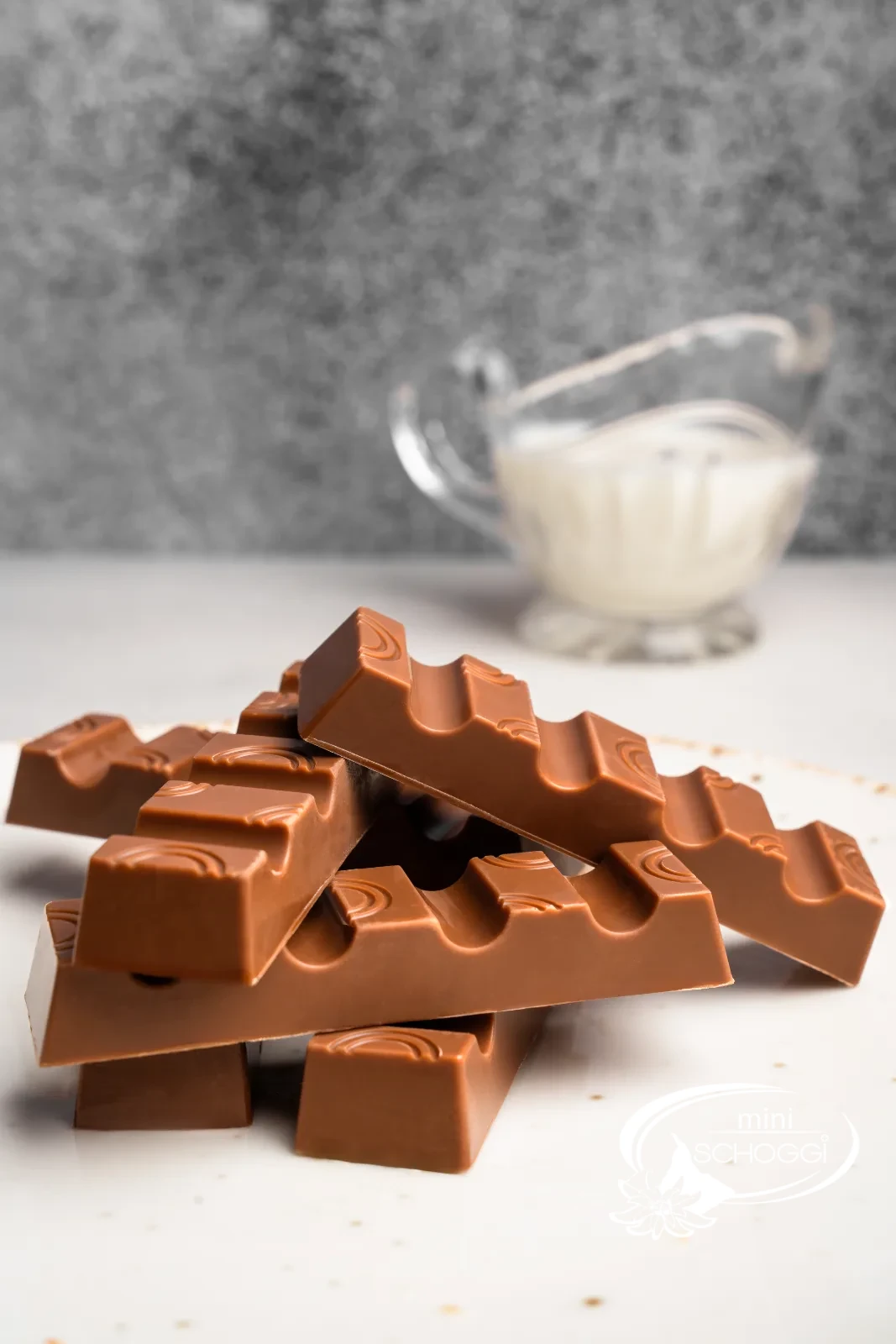 Homemade chocolate bars with light condensed milk ganache, sliced open