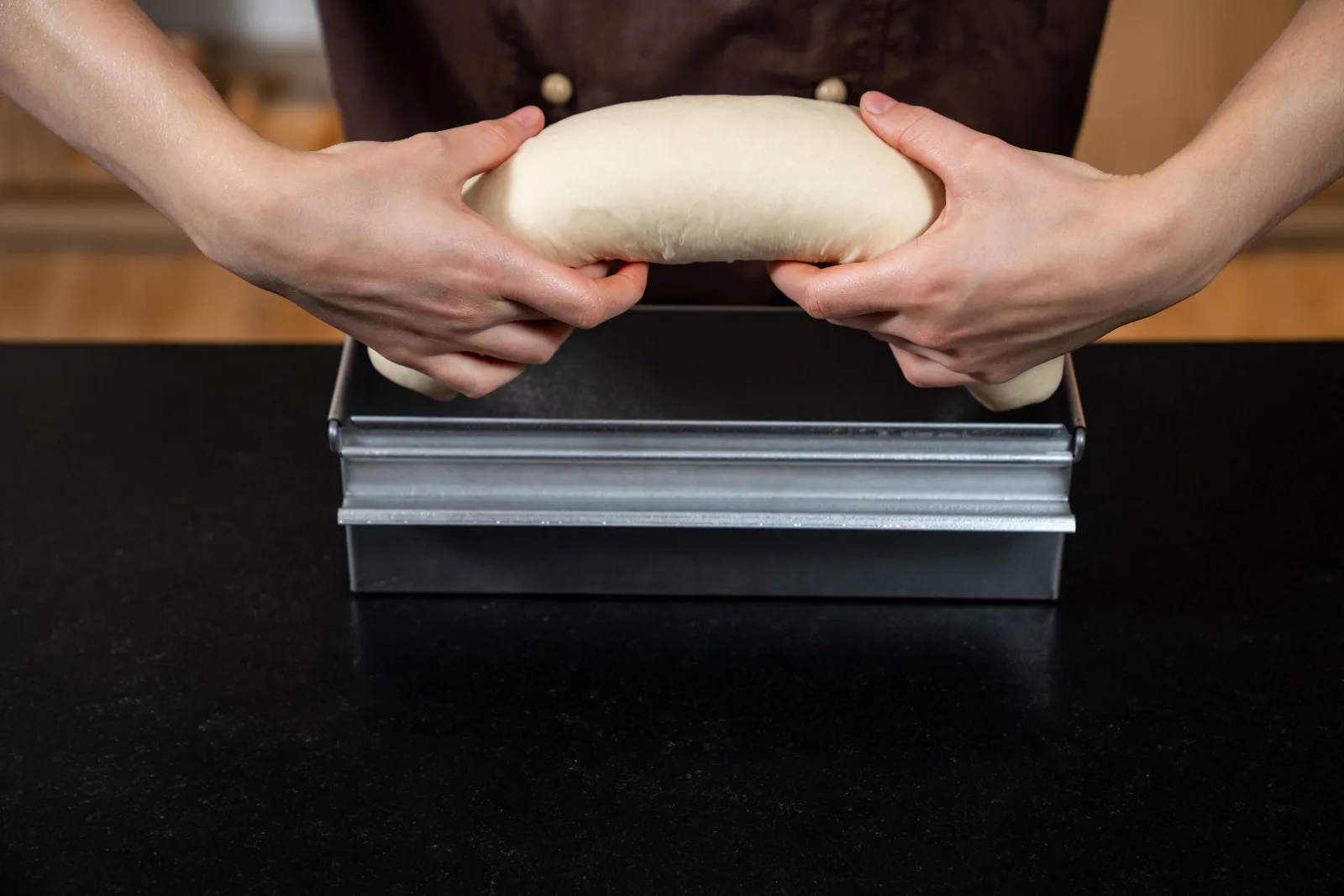Toast bread – prepare the baking tin and add the dough