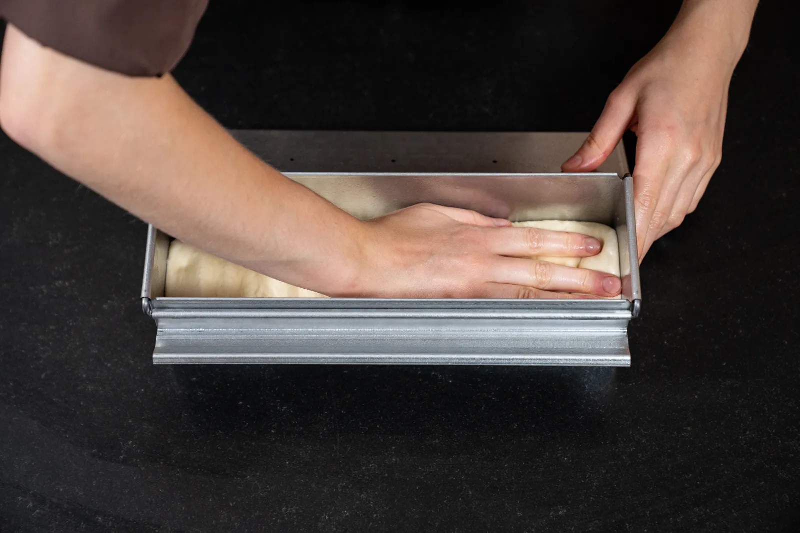 Toast bread – prepare the baking tin and add the dough